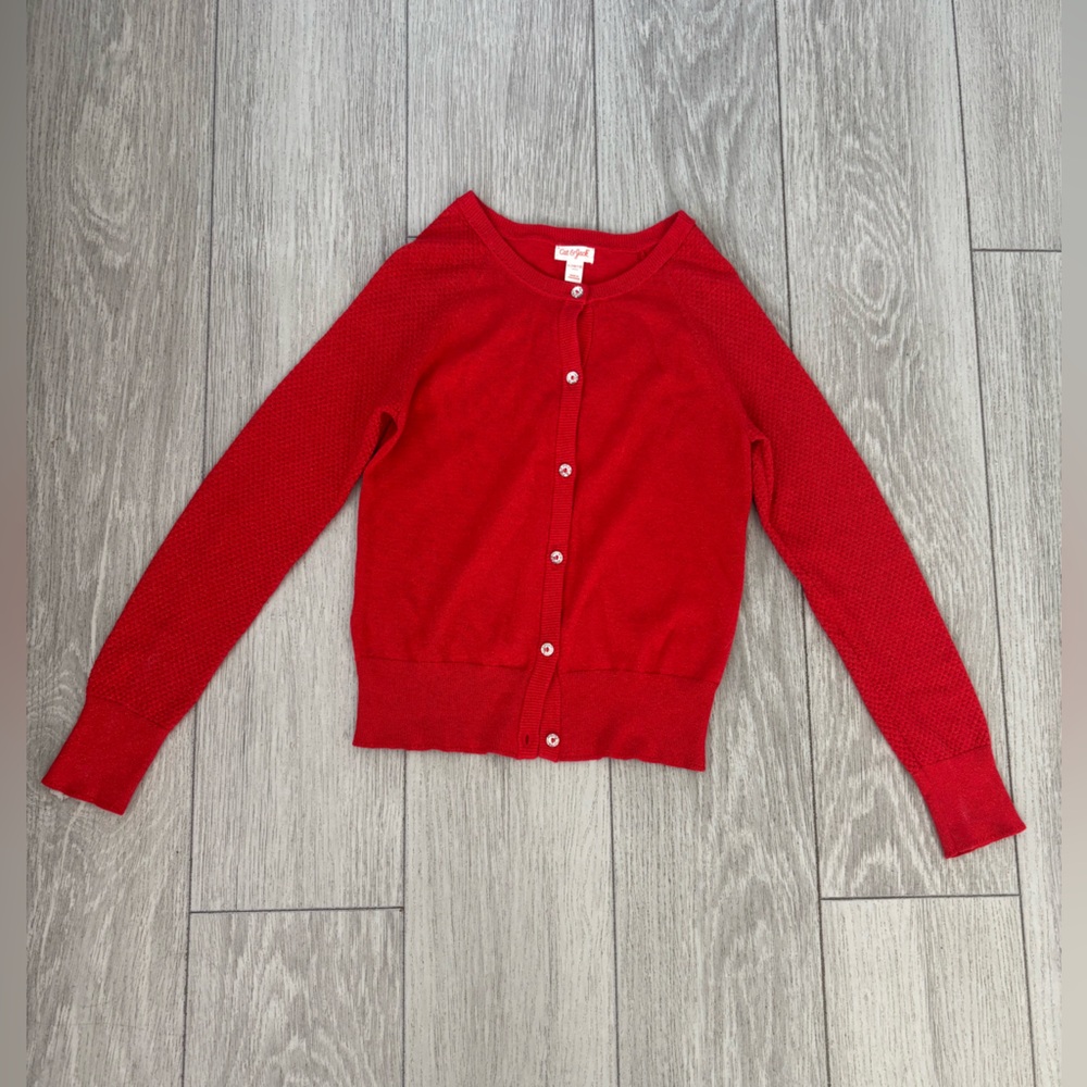 Sweater - girls red holiday with shimmer detail and crystal tone buttons.